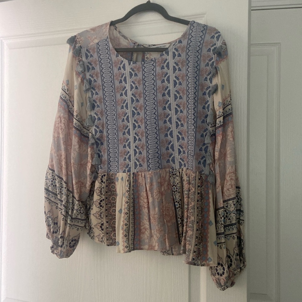 Flowy blouse with tassels
